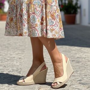 Christian Louboutin Cream Colored Peep-Toe Heels with Signature Red Sole